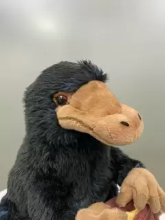 PELUCHE ESCARBATO CON BOLSO