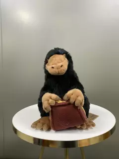 PELUCHE ESCARBATO CON BOLSO